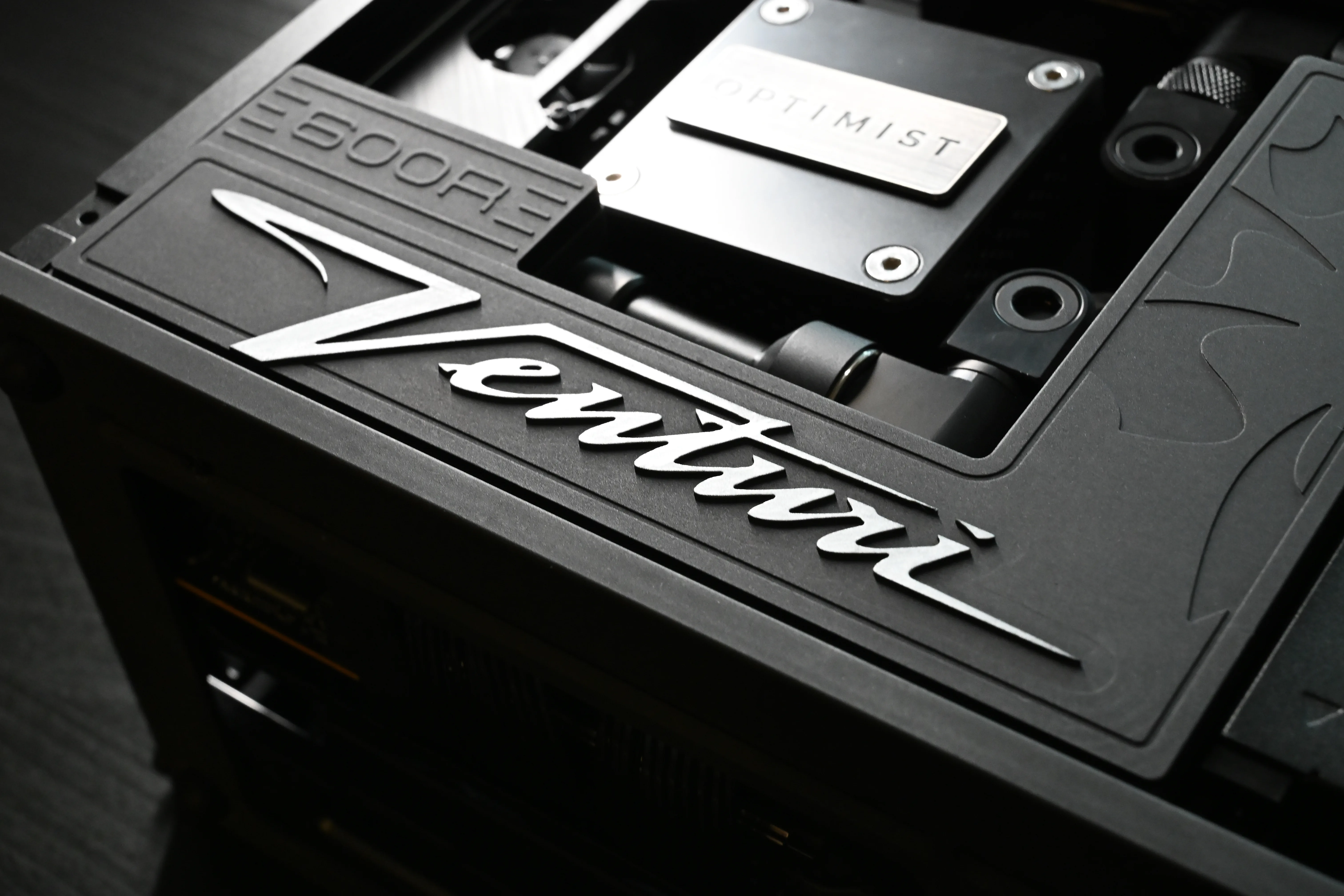 The engraved Venturi top cover, the Optimist water block beyond