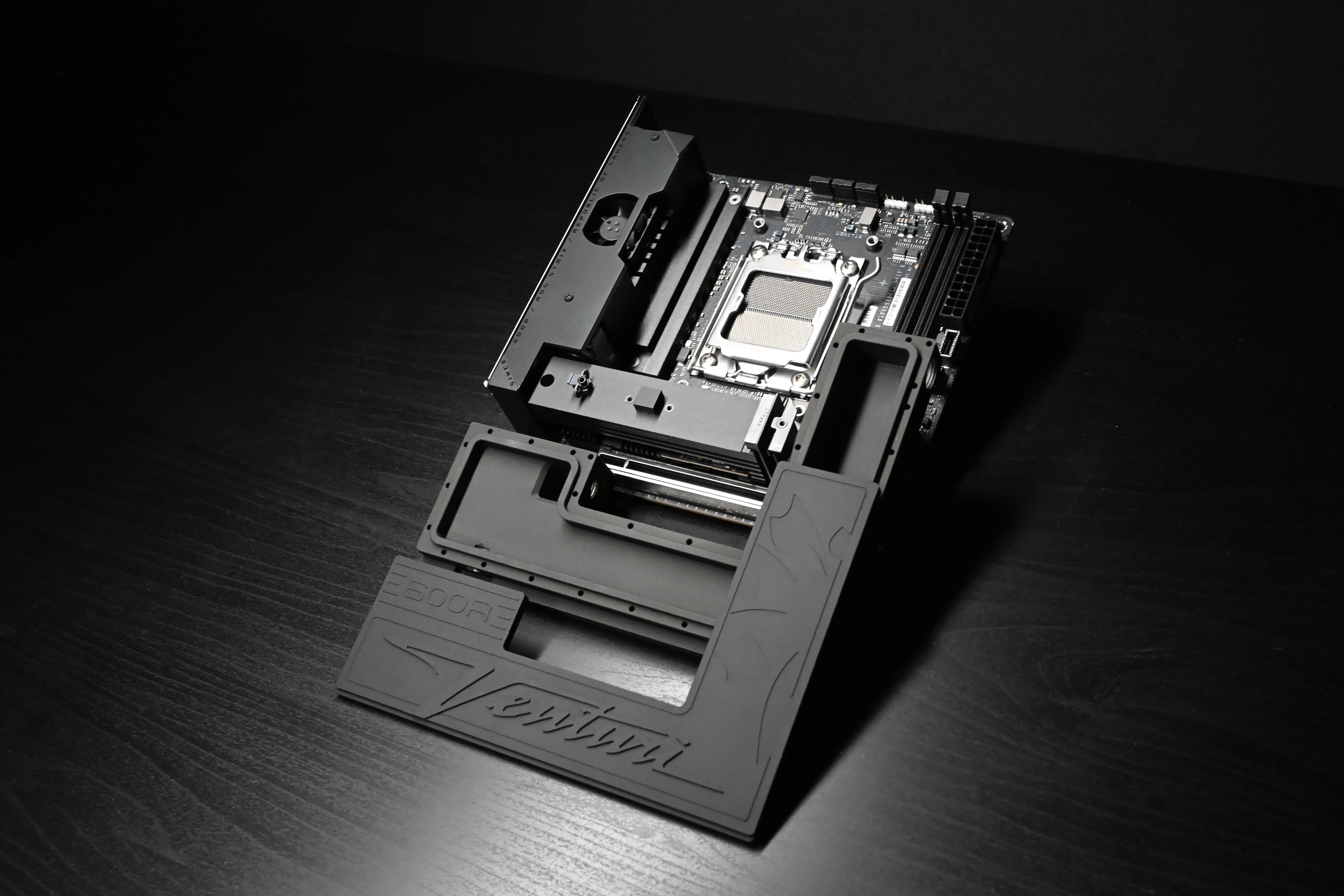 The Venturi's re-machined 600R chassis, open — bare board and frame